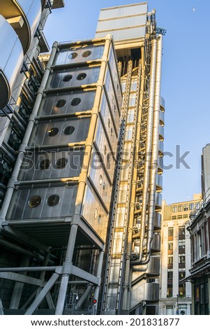 LONDON, UK - JUNE 03, 2013: View of Lloyd buildings (Inside - Out Building) at sunset - home of insurance institution Lloyd of London. Like Pompidou Centre in Paris was designed by Rogers (1986).