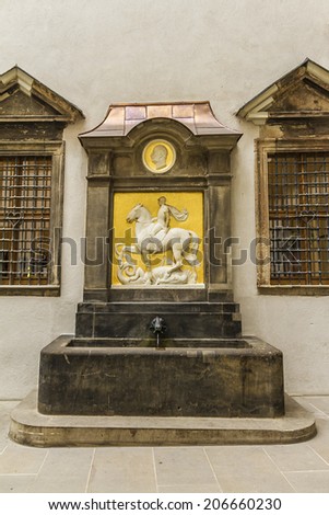 DRESDEN, GERMANY - MARCH 6, 2014: Architectural fragments of the Hall Staatliche Kunstsammlungen Dresden (Dresden State Art Collections) building in Dresden Castle. Old fountain.