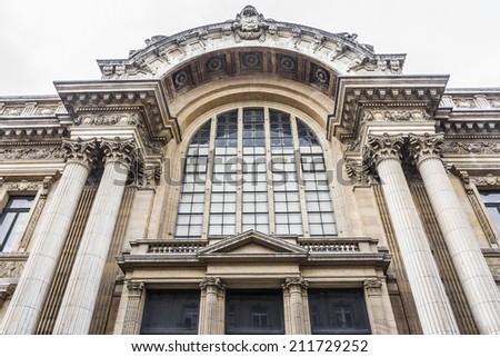 Architectural fragment of Famous building of Stock Exchange (Bourse de Bruxelles, Beurs van Brussel). Building was erected from 1868 to 1873 in the Neo-Renaissance style. Brussels, Belgium.