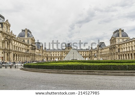 PARIS - JULY 13, 2012: Louvre building in Louvre Museum. Louvre - one of the world's largest museums and most visited art museum in the world. France.