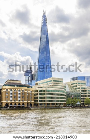 LONDON, UK - MAY 25, 2013: View from river of The Shard (Architect Renzo Piano, 2012) - tallest building in European Union. Glass-clad pyramidal tower (310 m) has 72 habitable floors.