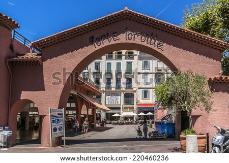 CANNES, FRANCE - JULY 10, 2014: View of market Forville - seasonal produce, local fish and flowers, this large covered market in the heart of the city.