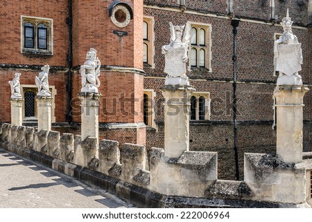 LONDON, UK - JUNE 4, 2013: Architectural fragment of Entrance to Hampton Court, Richmond-Upon-Thames. Hampton Court (1514) was originally built for Cardinal Thomas Wolsey, favorite of King Henry VIII.