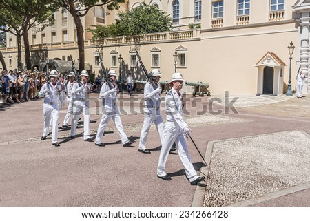 MONTE CARLO, MONACO - JULY 8, 2014: Ceremonial changing of guard at residence of Prince of Monaco. Guards unit was created in 1817 to provide security for the Palace, Sovereign Prince and his family.