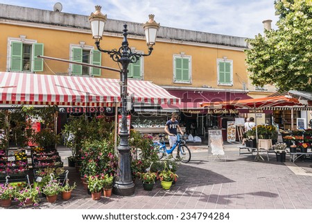 NICE, FRANCE - JULY 11, 2014: View of Cours Saleya. Cours Saleya is the most famous market area of Nice.