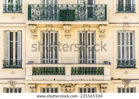 French house with traditional balconies and windows. Nice, France.