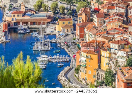 View of luxury resort Villefranche-sur-Mer and bay on French Riviera at Mediterranean Sea. Cote d\'Azur. France. Villefranche-sur-Mer adjoins city of Nice to the east and 10 km south west of Monaco.