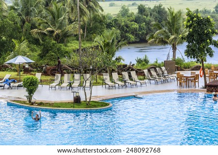 ARPORA, GOA, INDIA - SEPTEMBER 23, 2013: View of Resort Rio - Deluxe Spa resort (77 Deluxe room, 5 Royal suites) in Goa, is spread over 10 acres on banks of Baga river. North Goa. Swimming pool.