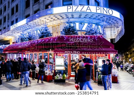 PARIS, FRANCE - 22 DECEMBER, 2014: Christmas illumination at Avenue Champs-Elysees. Champs-Elysees is one of the most famous streets in the world.
