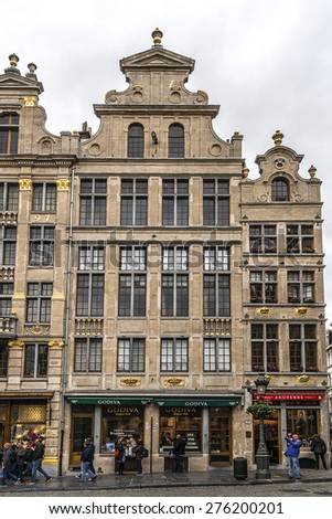 BRUSSELS, BELGIUM - MAY 11, 2014: Houses of the famous Grand Place (Grote Markt) - the central square of Brussels. Grand Place was named by UNESCO as a World Heritage Site in 1998.
