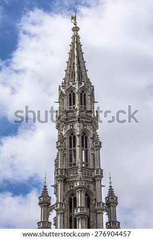 Architectural fragment of Town Hall (Hotel de Ville) on Grand Place (Grote Markt) - central square of Brussels - most important tourist destination and most memorable landmark in Brussels, Belgium.