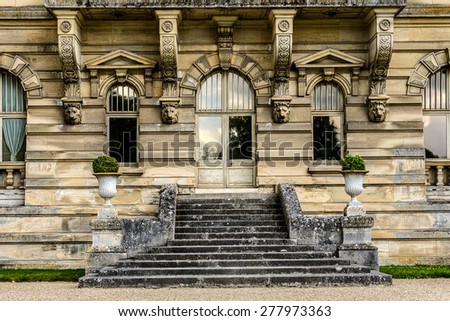 Architectural fragments of famous Chateau de Chantilly (Chantilly Castle, 1560) - a historic chateau located in town of Chantilly, Oise, Picardie, France.