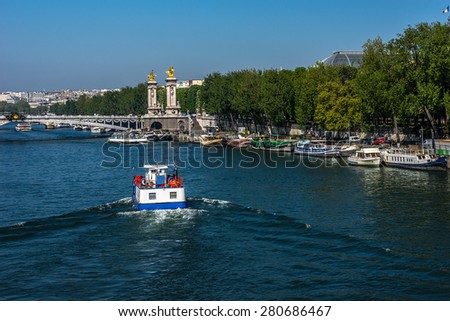 The picturesque embankments of the Seine River. Paris, France.