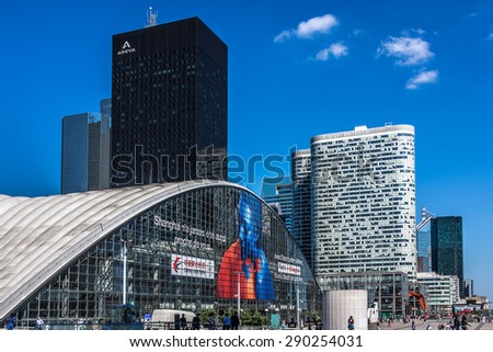 PARIS, FRANCE - JUNE 3, 2015: Skyscrapers in business district of Defense in Paris. Defense is the biggest business district in France and most of large companies have offices here.