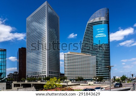 PARIS, FRANCE - JUNE 3, 2015: Skyscrapers in business district of Defense to the west of Paris. Defense is biggest business district in France and most of large companies have offices here.