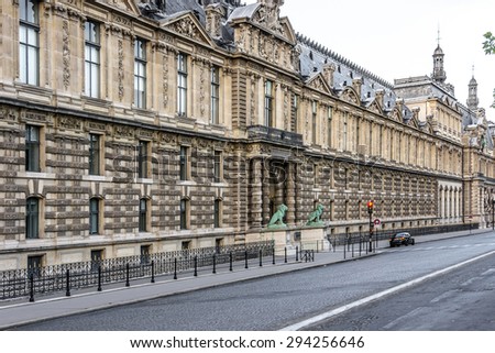 PARIS, FRANCE - JUNE 10, 2015: View of famous Louvre Museum at evening. Louvre Museum is one of the largest and most visited museums worldwide.