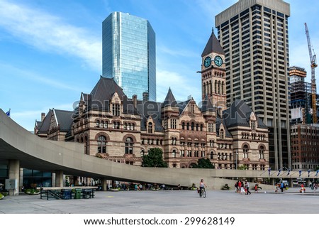TORONTO, CANADA - 23 JULY, 2014: Toronto\'s Old City Hall (architect Edward James Lennox, 1899) was home to its city council from 1899 to 1966 and remains one of the city\'s most prominent structures.
