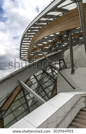 PARIS, FRANCE - APRIL 25, 2015: Modern architecture of Louis Vuitton Foundation (American architect Frank Gehry, 2014). Louis Vuitton Foundation is an art museum and cultural center.
