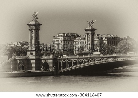 Sculpture on Alexandre III bridge. The bridge, with its exuberant Art Nouveau lamps, cherubs, nymphs and winged horses at either end, was built between 1896 and 1900. Antique vintage.