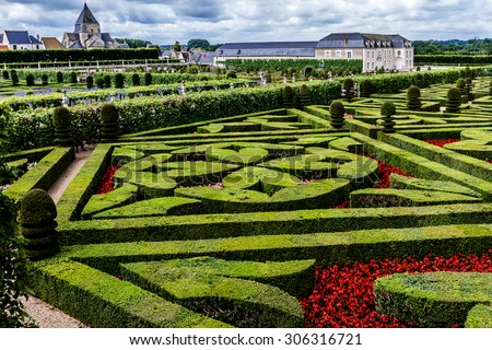 VILLANDRY, FRANCE - JULY 20, 2012: Traditional French garden in Chateau de Villandry. Chateau de Villandry (castle-palace) - world known for its amazing gardens.