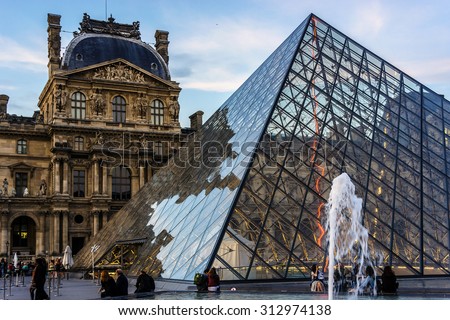 PARIS, FRANCE - JUNE 10, 2015: View of famous Louvre Museum at evening. Louvre Museum is one of the largest and most visited museums worldwide.