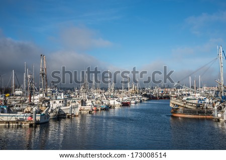 SEATTLE, WA - JANUARY 20, 2013: North Pacific Fishing Fleet and Recreational Craft moored at Fishermen's Terminal, both a working dock and a Seattle tourist attraction, celebrates 100 years in 2014.