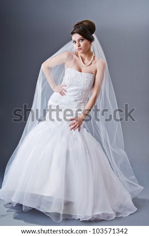 Bride in wedding dress in studio shooting