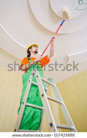 Painter worker during painting job