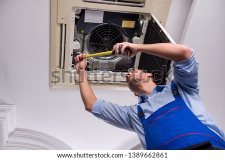 Similar – Image, Stock Photo Workman with measuring tape making surf board