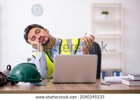 Similar – Image, Stock Photo Architect man having breakfast while working at computer in office