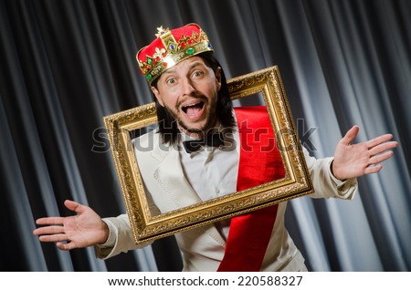 King with picture frame in funny concept