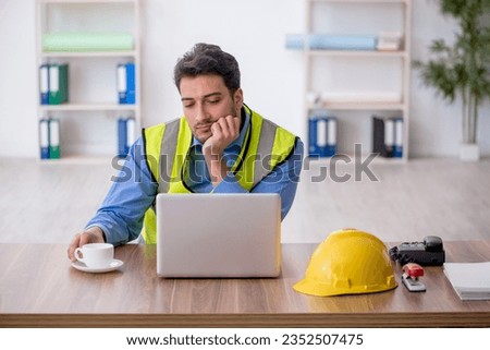 Similar – Image, Stock Photo Architect man having breakfast while working at computer in office