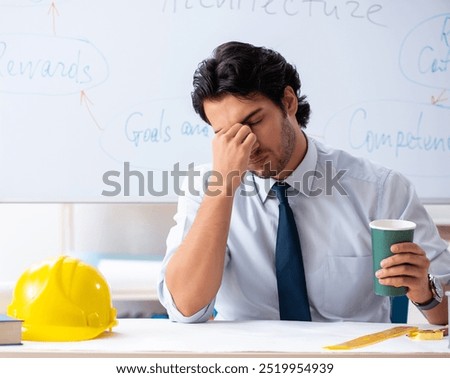 Image, Stock Photo Architect man having breakfast while working at computer in office