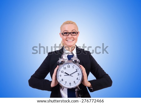 Woman with giant clock on white