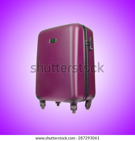 Travel luggage against the gradient background