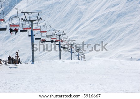 Ski lift chairs on bright winter day - more similar photos in my portfolio