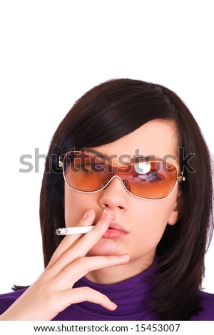 Health issues concept - Young girl smoking cigarette
