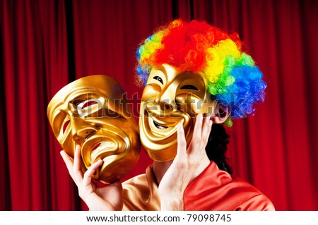 Actor with masks in a funny theater concept