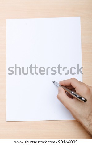 Hand writing a letter