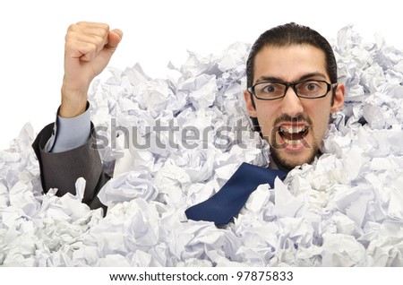 Man with lots of waste paper