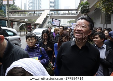 HONG KONG - March 2: Lew Mon-hung and 13000 Hongkongers march to condemn the brutal knife attack on Kevin Lau Chun-To, ex-editor of Ming Pao, and support press freedoms on March 2, 2014 in Hong Kong.