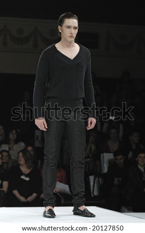 MELBOURNE - SEPTEMBER 5: A Male model wears garments by Leopold during the Melbourne Spring Fashion Week (MSFW), Modern Odyssey, on September 4, 2008 in Melbourne.