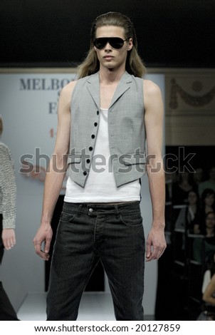 MELBOURNE - SEPTEMBER 5: A Male model wears garments by Leopold during the Melbourne Spring Fashion Week (MSFW), Modern Odyssey, on September 4, 2008 in Melbourne.