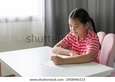 Similar – Image, Stock Photo Child doing homework