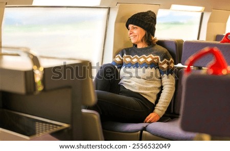 Similar – Image, Stock Photo Tourists gazing at breathtaking snowy mountain slope