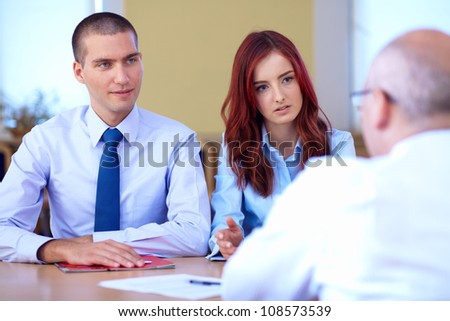 Job interview, two young colleagues from hr department and senior applicant