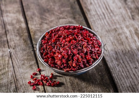 Dried barberries in iron cradling