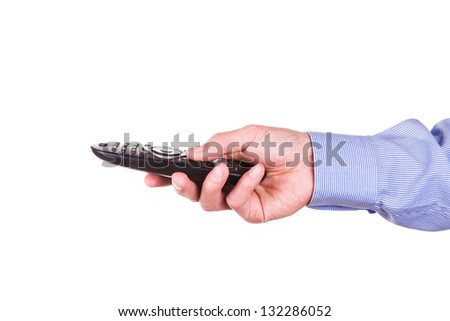 Male hand holding TV remote control isolated on white background