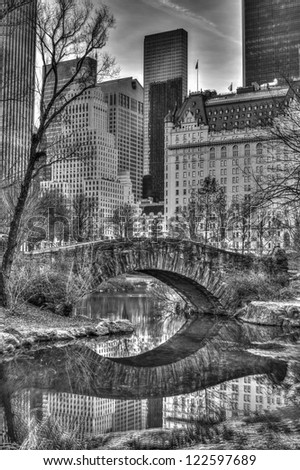 Gapstow Bridge is one of the icons of Central Park, Manhattan in New York City. Gapstow stands 12 feet high, spans 44 feet of water, and stretches 76 feet in its full length