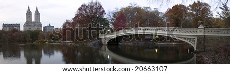 Panoramic photo of bow bridge in Central Park in Autumn